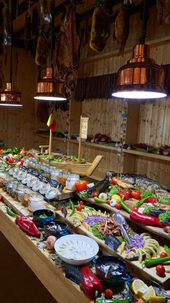 Traditional buffet with fresh vegetables and local dishes at Cherhana